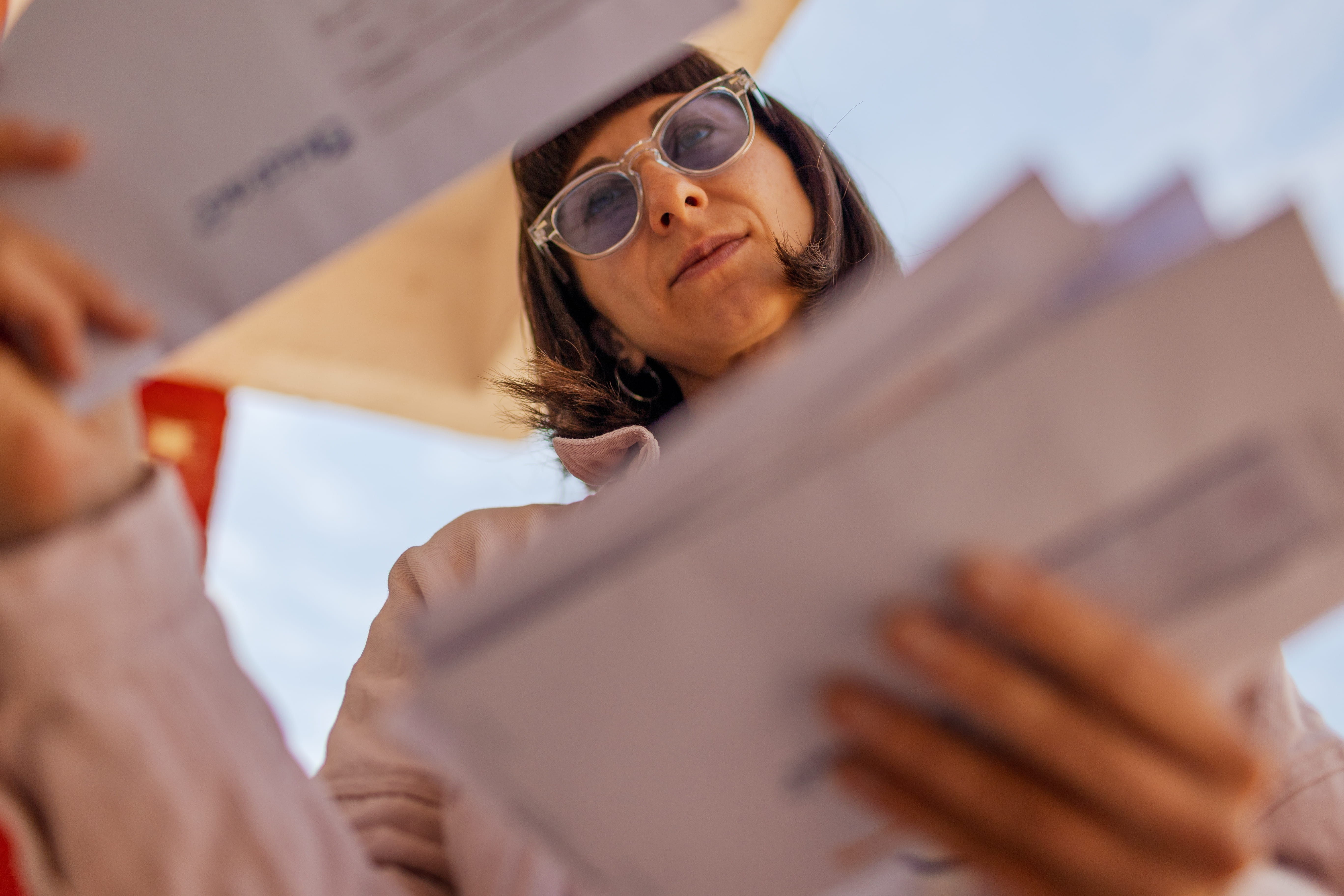 Woman sorting through her mail